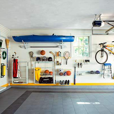 organized garage with all items storage on wall and ceiling.