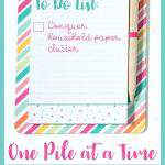 colorful clipboard - text "one pile at a time paper declutter challenge".