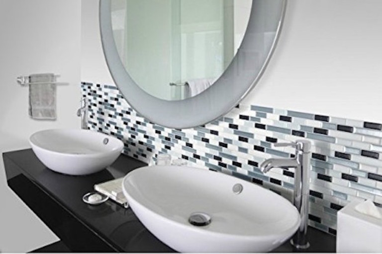 Use peel and stick tiles for an inexpensive upgrade when selling your home via Refined Rooms