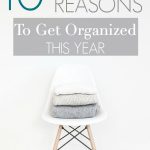 chair with neatly folded clothing - text "10 reasons to get organized this year".
