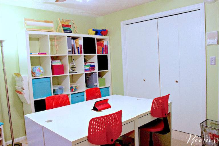 This room was transformed into an awesomely organized home school space using IKEA storage products, including this Kallax shelving. Click to see the transformation!