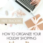 woman typing on laptop surrounded by wrapped gifts - text "how to organize your holiday shopping like a pro: free gift trackers".